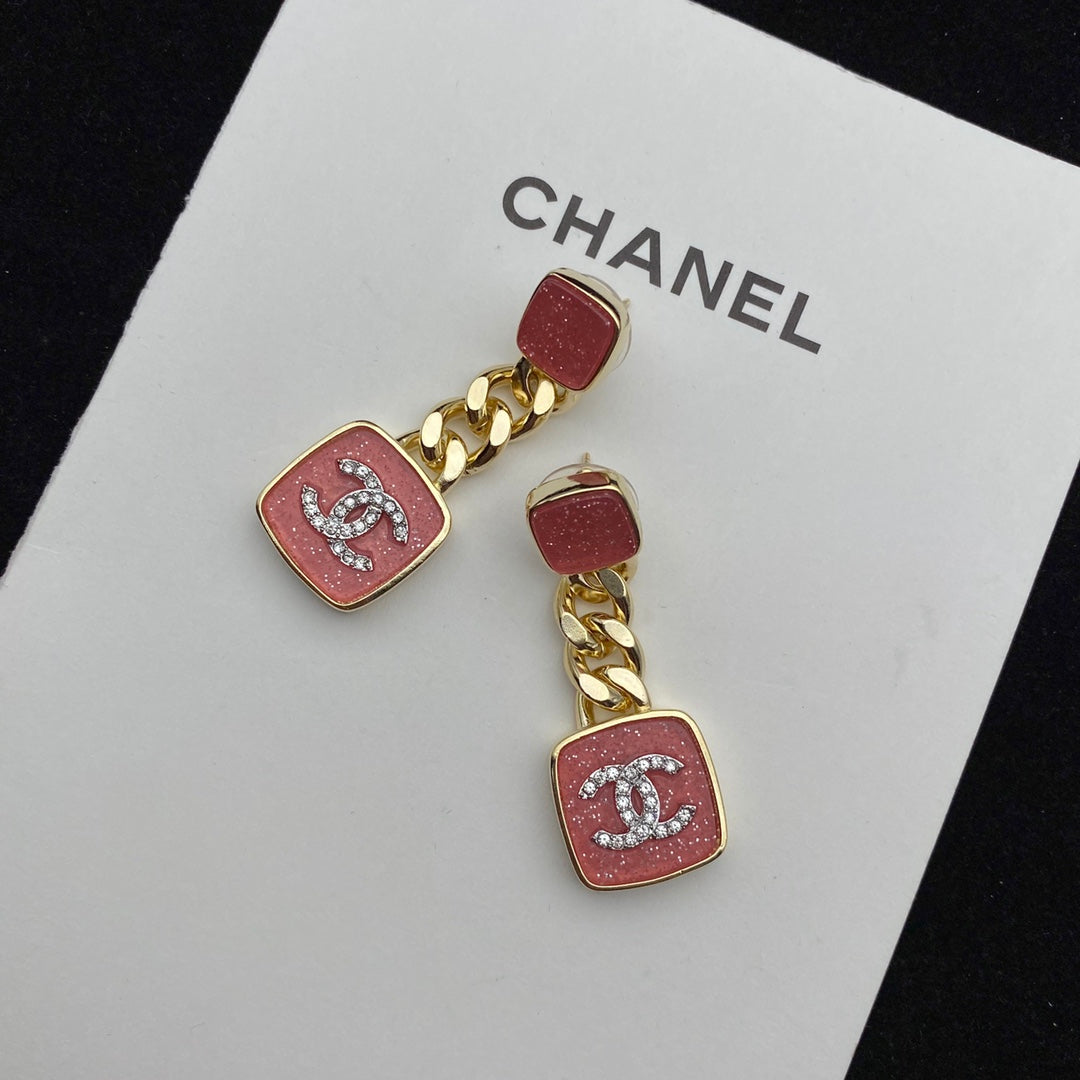 Boucles d'oreilles émaillées rose étincelant