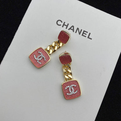 Boucles d'oreilles émaillées rose étincelant