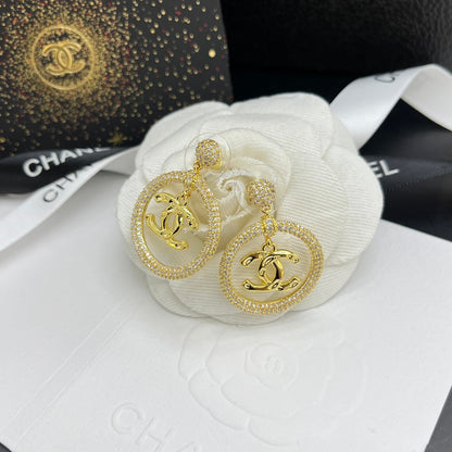 Pendientes de aro con colgante de diamante