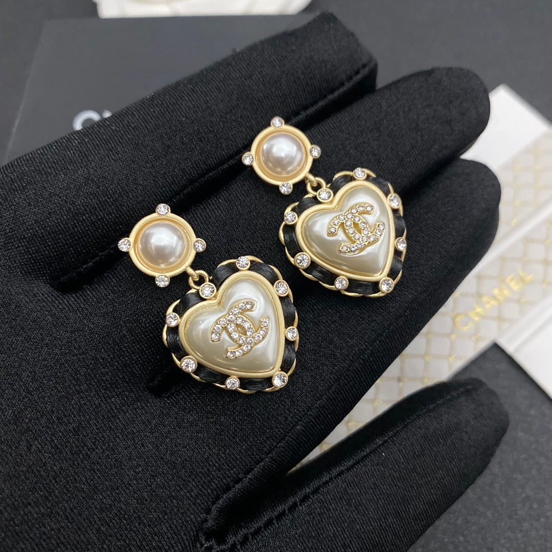Boucles d'oreilles cœur perle en cuir