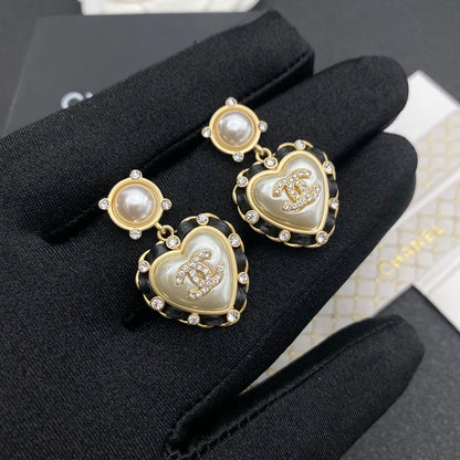 Boucles d'oreilles cœur perle en cuir
