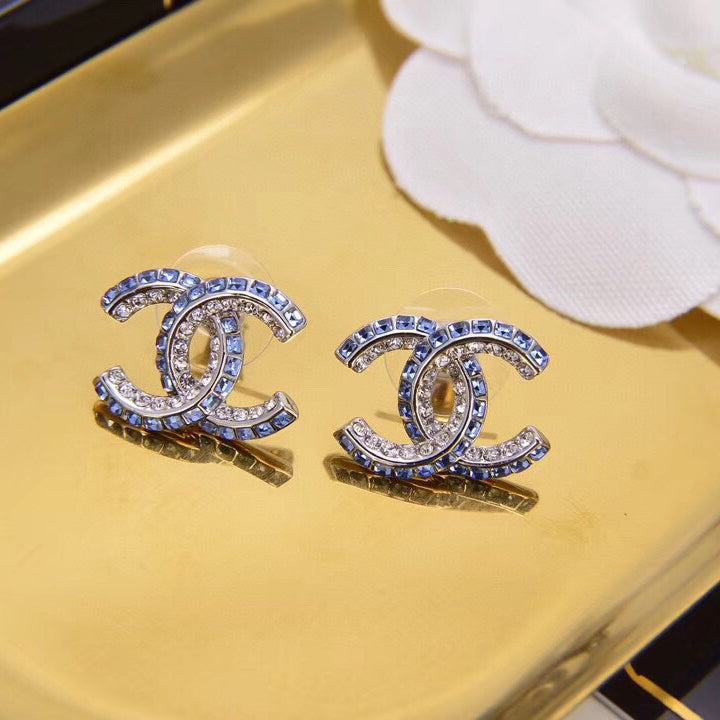 Boucles d'oreilles lettre diamant double rangée bleues