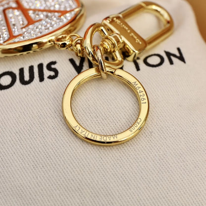 Porte-clés pendentif rond entièrement serti de diamants