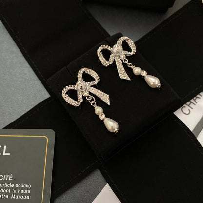 Boucles d'oreilles nœud en diamant de cristal de tempérament