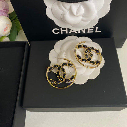 Boucles d'oreilles en cuir noir et ton or