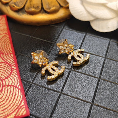 Pendientes de moda con logo de estrella de diamantes