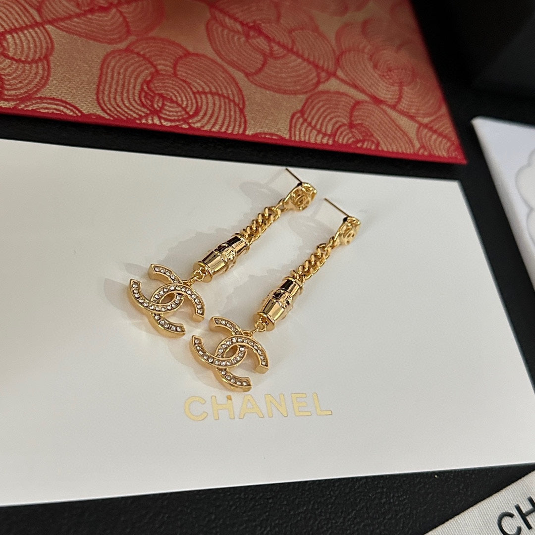 Pendientes colgantes de diamantes de imitación dorados