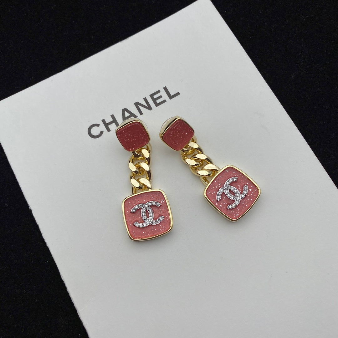 Boucles d'oreilles émaillées rose étincelant