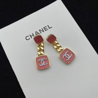 Boucles d'oreilles émaillées rose étincelant