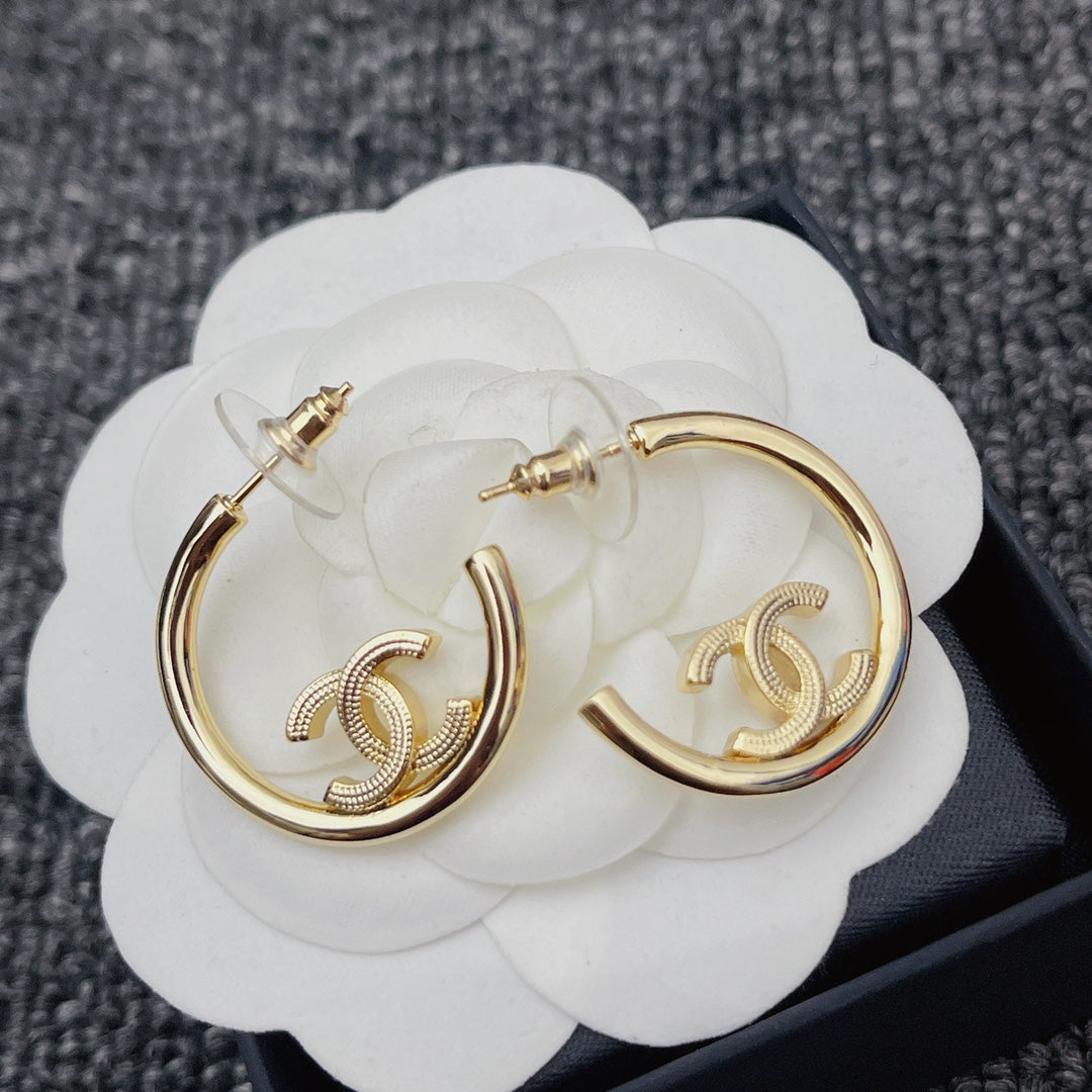 Boucles d'oreilles créoles demi-cercles Or Premium