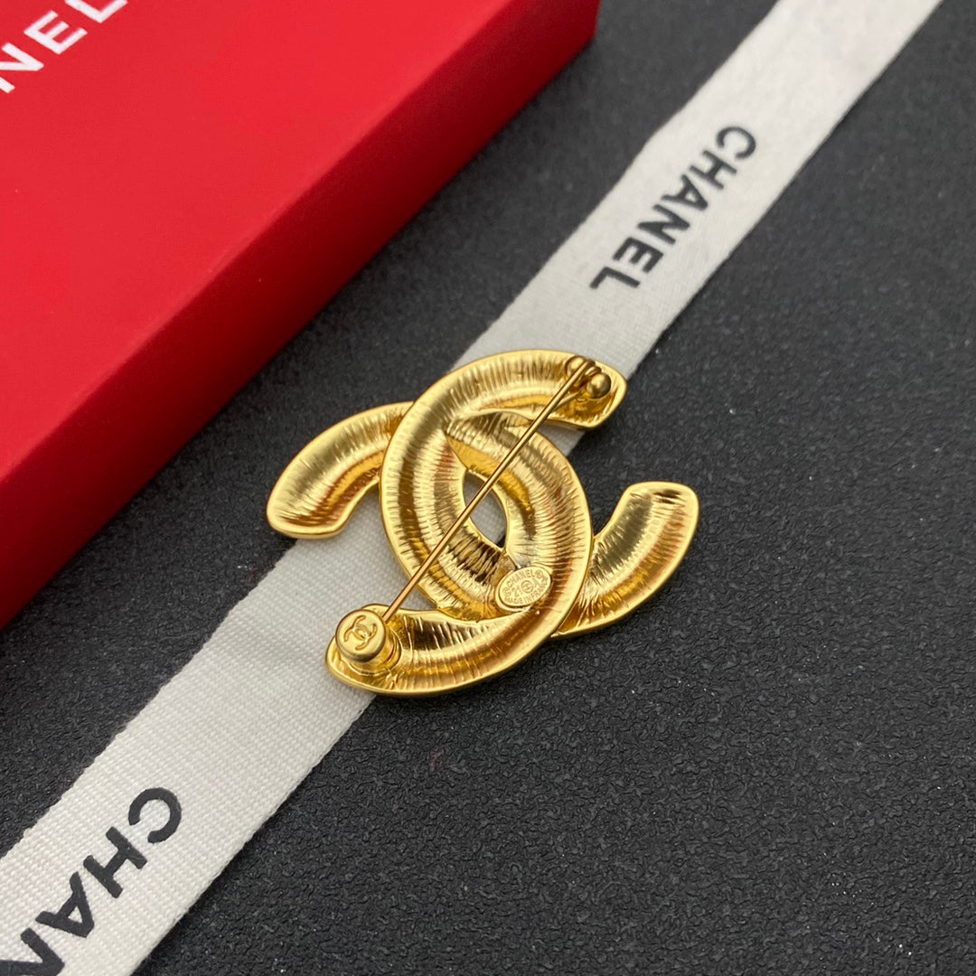 Broche à motif losange