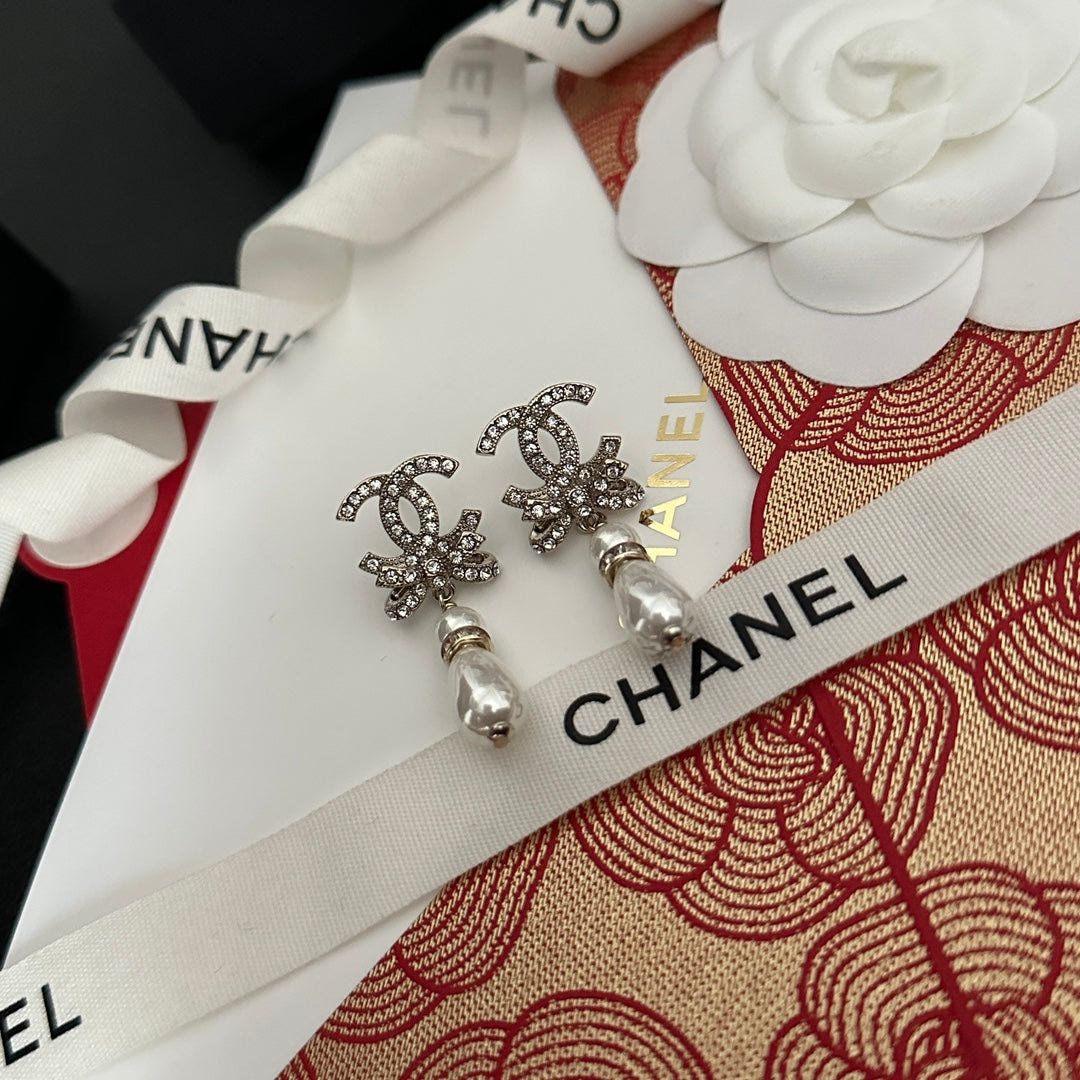 Pendientes de lazo de diamante y perlas