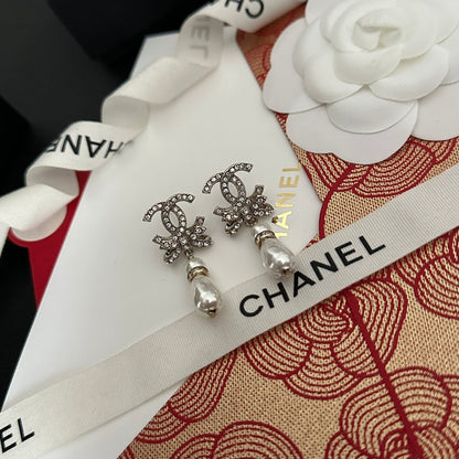Pendientes de lazo de diamante y perlas
