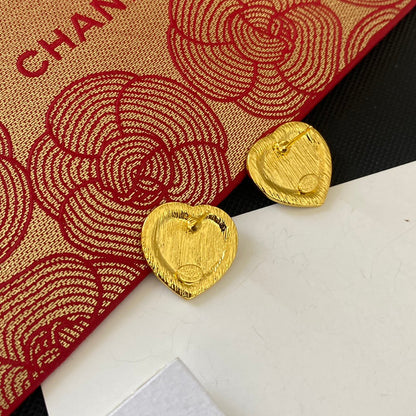 Boucles d'oreilles clous cœur à paillettes