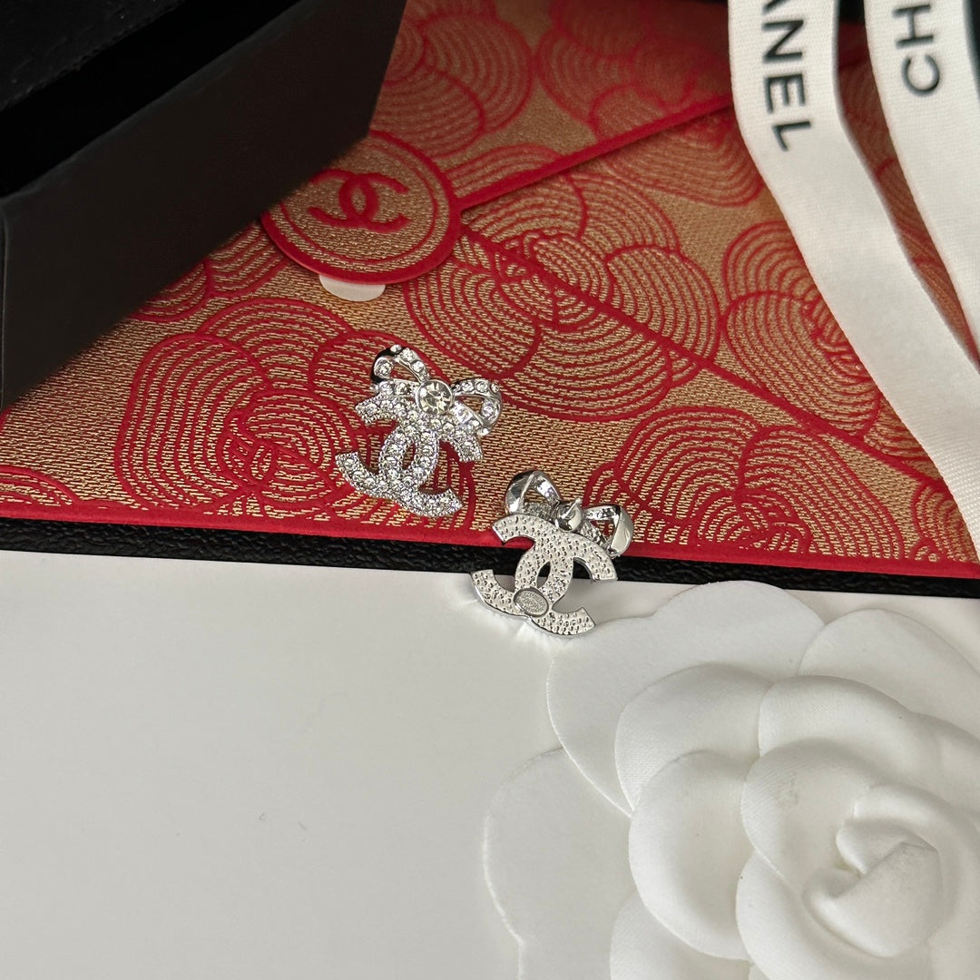 Nouvelles boucles d'oreilles nœud papillon en cristal