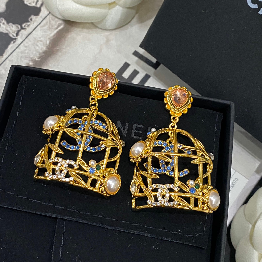 Boucles d'oreilles clous Retor Gold Cage à oiseaux