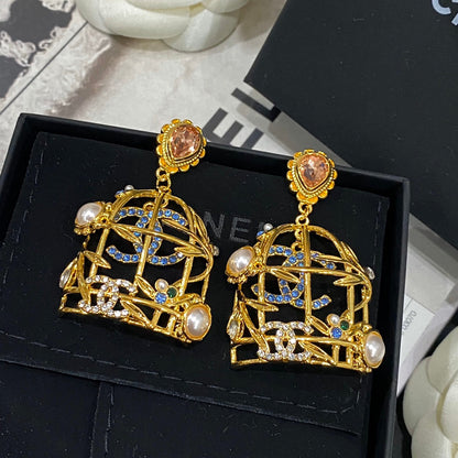 Boucles d'oreilles clous Retor Gold Cage à oiseaux