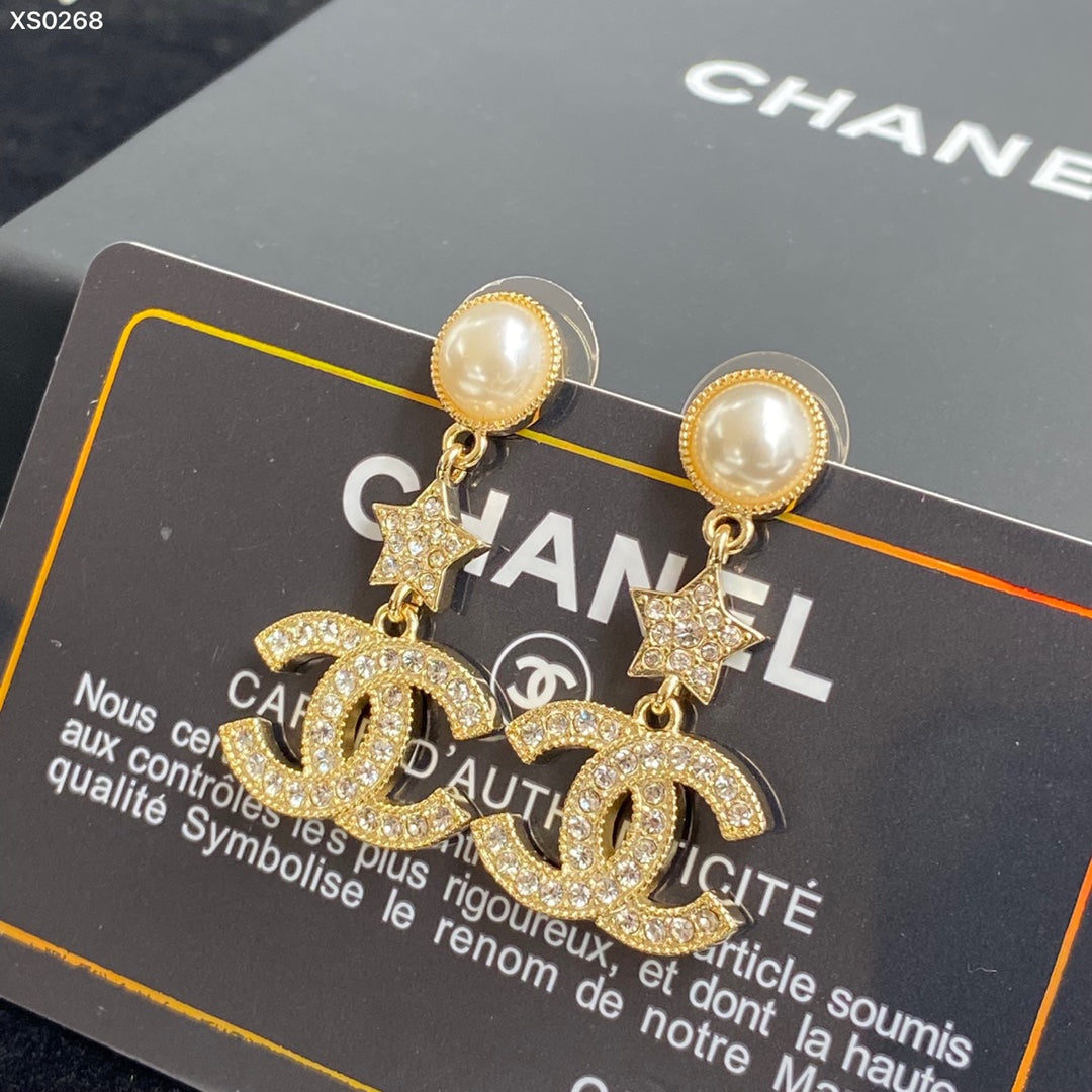 Boucles d'oreilles lettre étoile en zircon étincelant