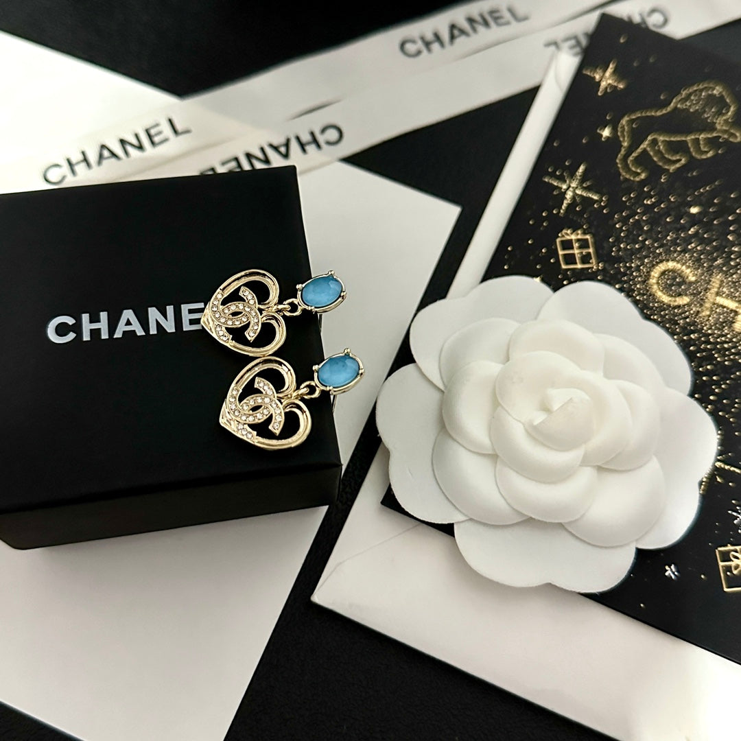 Boucles d'oreilles élégantes en forme de cœur avec gemme