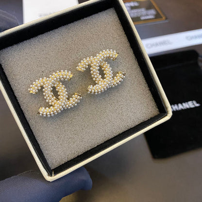 Boucles d'oreilles clous Tempérament Perle Logo