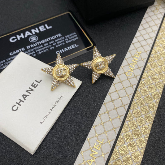 Pendientes de tuerca de estrella con circonitas brillantes