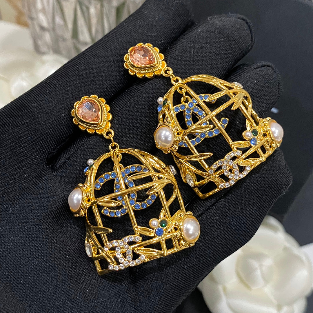 Boucles d'oreilles clous Retor Gold Cage à oiseaux