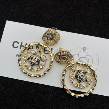 Boucles d'oreilles élément étoile baroque