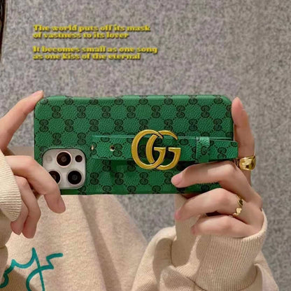 Étui en cuir avec bracelet à monogramme