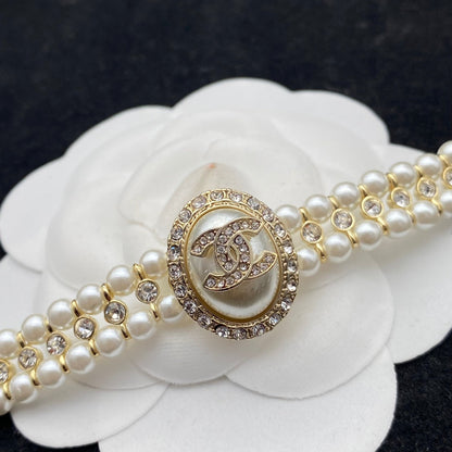 Pulsera de doble fila de perlas y diamantes