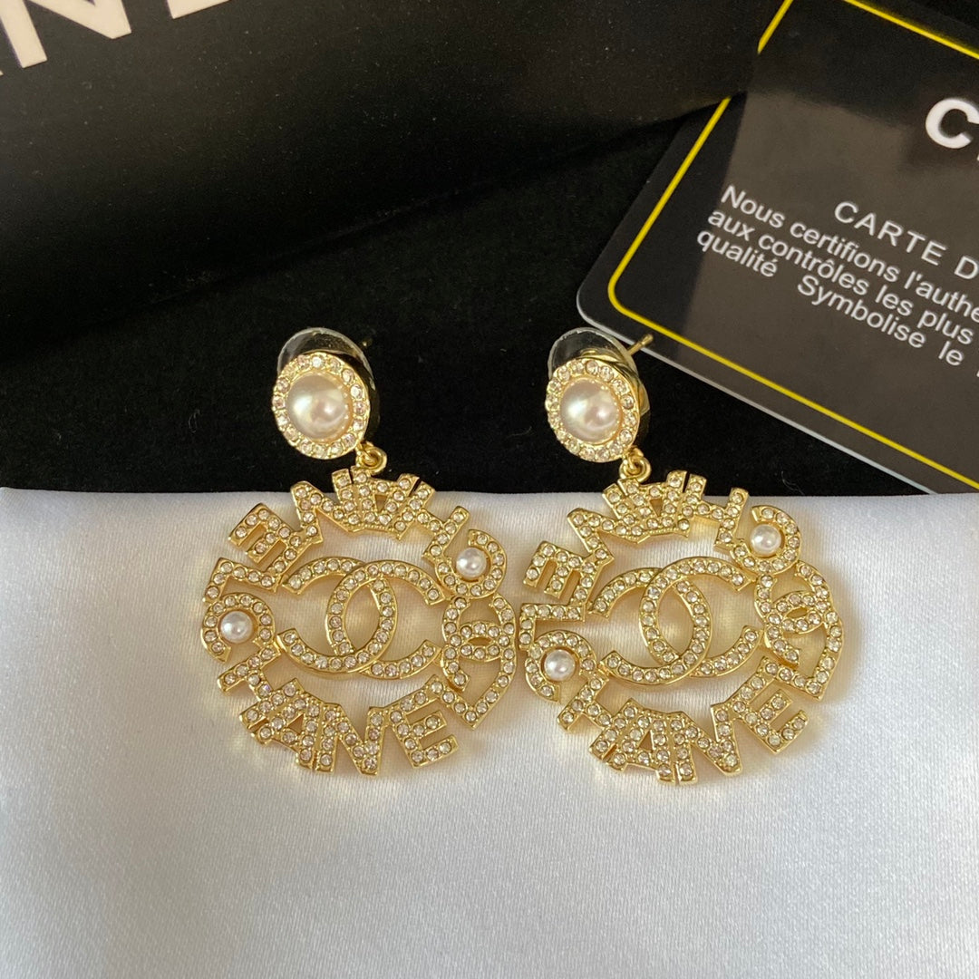 Boucles d'oreilles en diamant rond Lettres Tempérament
