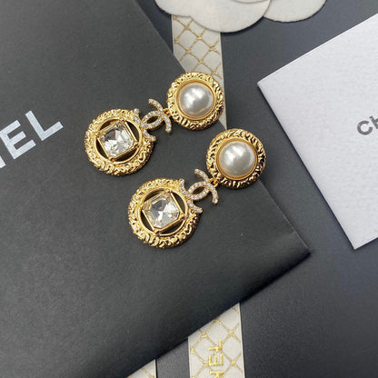 Boucles d'oreilles pendantes élégantes en cristal diamanté