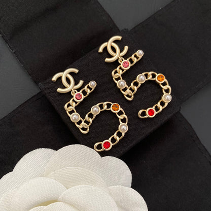 Nouvelles boucles d'oreilles n°5 en diamant de couleur