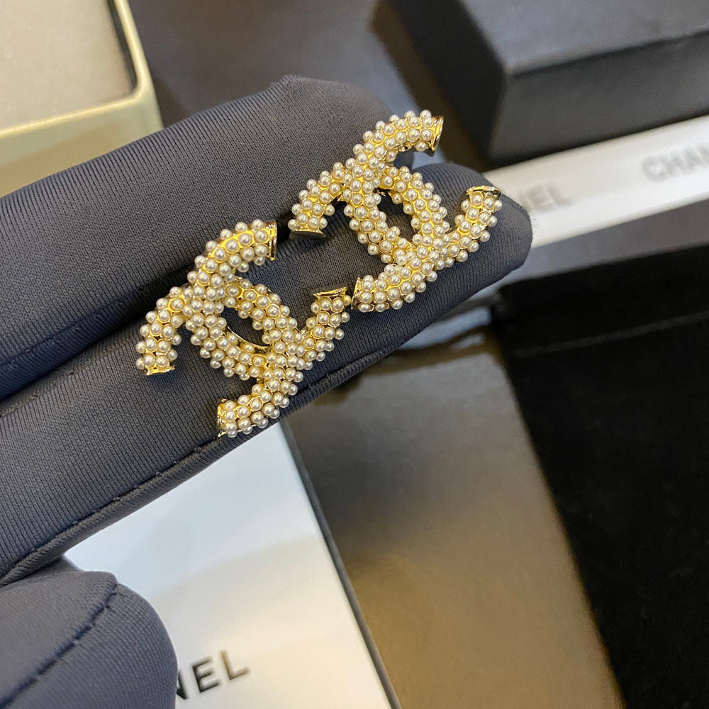 Boucles d'oreilles clous Tempérament Perle Logo