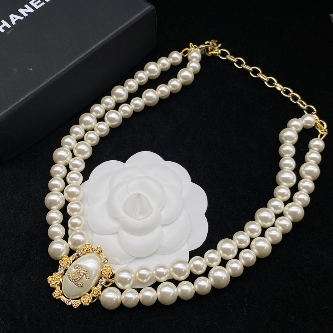 Élégant collier double perle