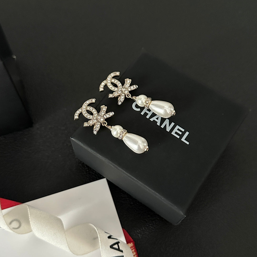 Pendientes de lazo de diamante y perlas
