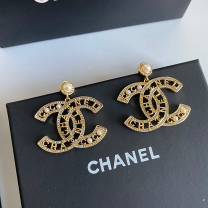 Boucles d'oreilles élégantes alphabet découpé