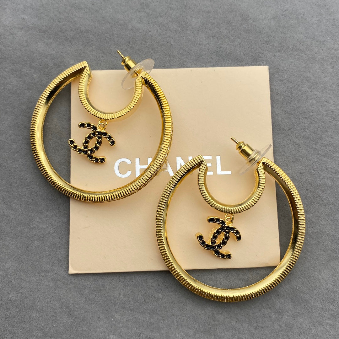 Boucles d'oreilles pendantes lune double C