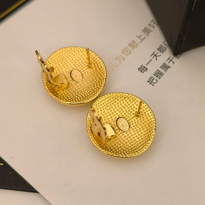 Pendientes redondos dorados vintage