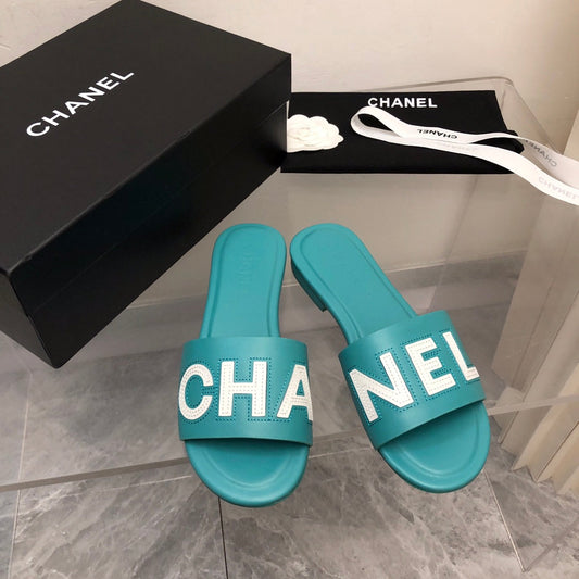 Mules en cuir motif alphabet blocs de couleur