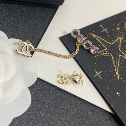 Boucles d'oreilles clips asymétriques en cristal