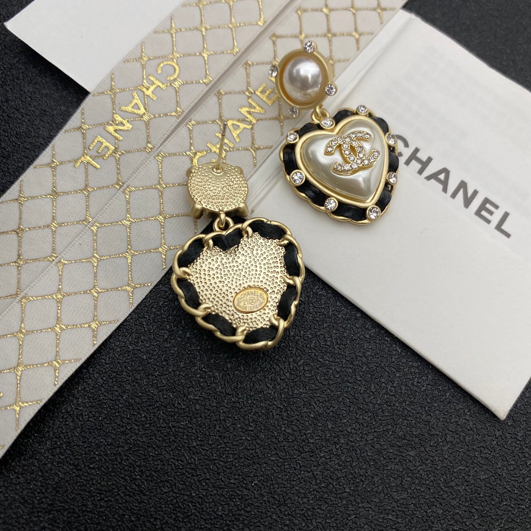 Boucles d'oreilles cœur perle en cuir