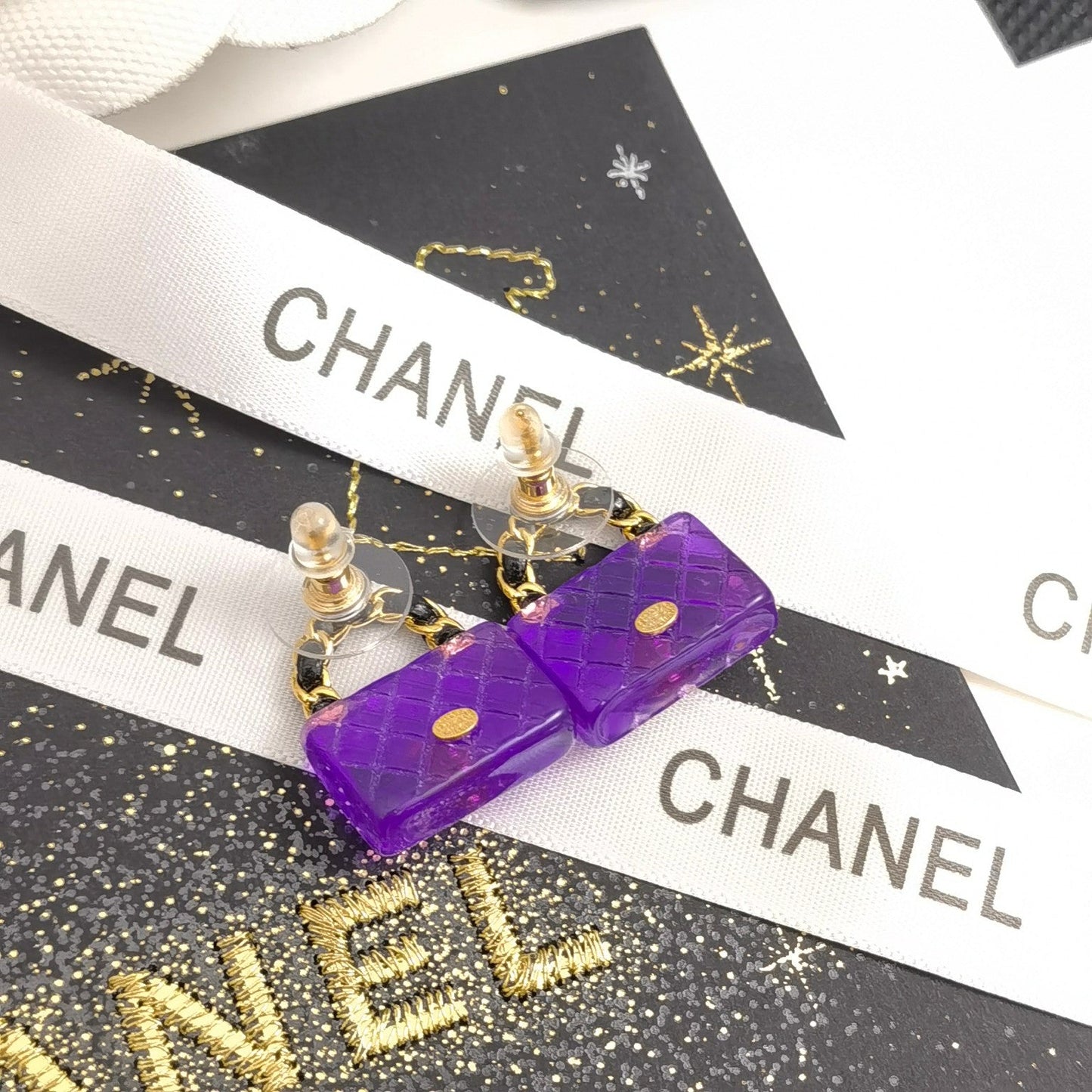 Boucles d'oreilles sac élégantes violettes