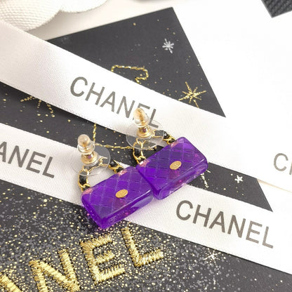 Boucles d'oreilles sac élégantes violettes