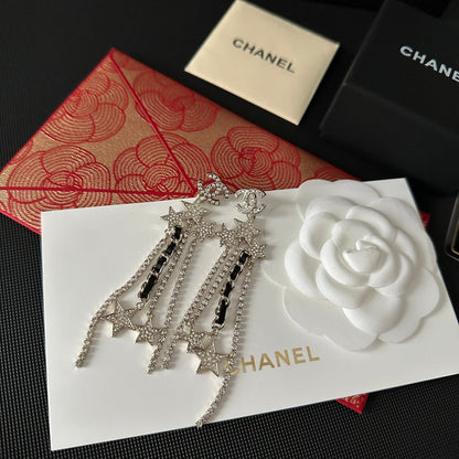 Pendientes largos con colgante de estrella de diamantes de imitación