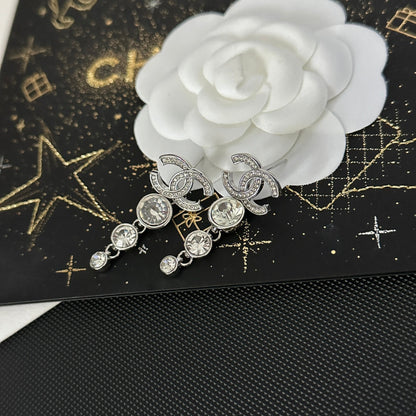 Boucles d'oreilles pendantes en diamants ronds