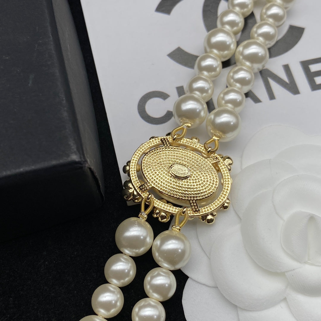 Élégant collier double perle