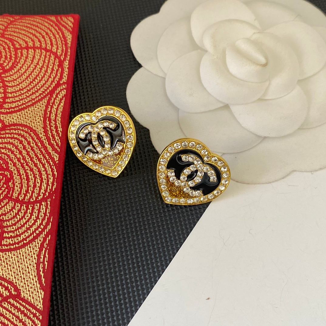 Boucles d'oreilles clous cœur à paillettes