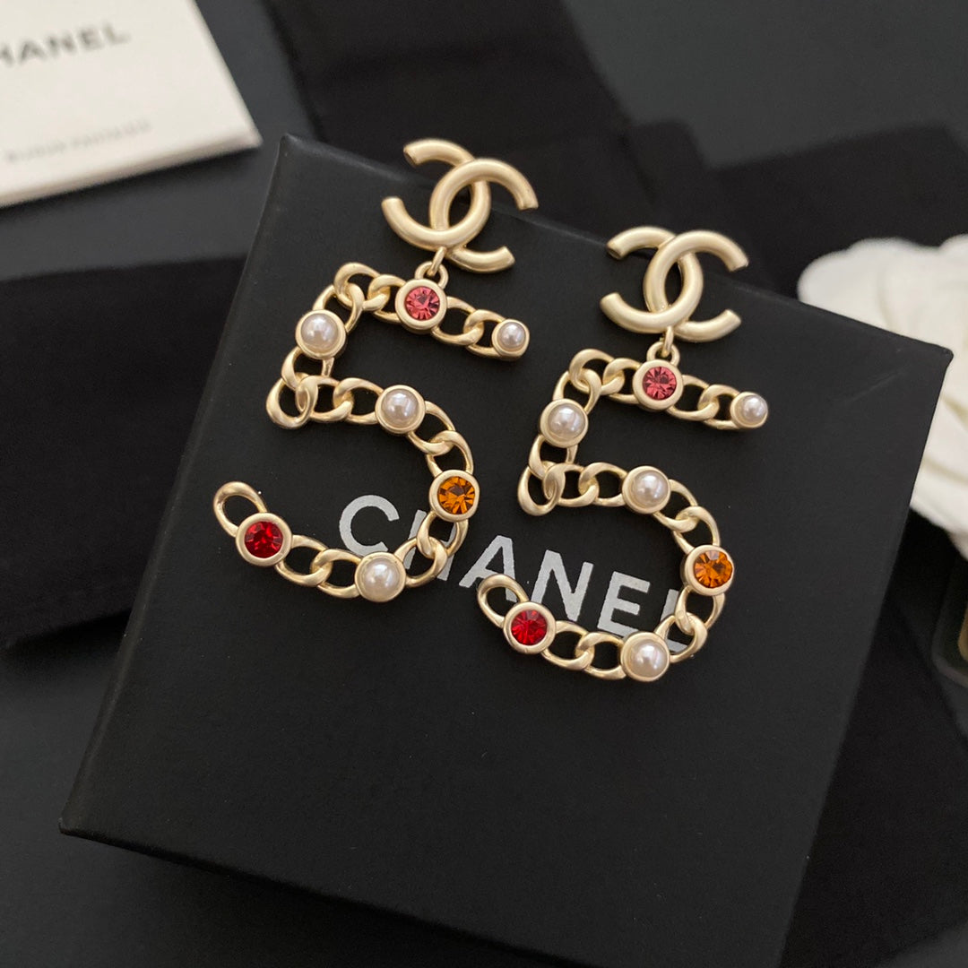Nouvelles boucles d'oreilles n°5 en diamant de couleur