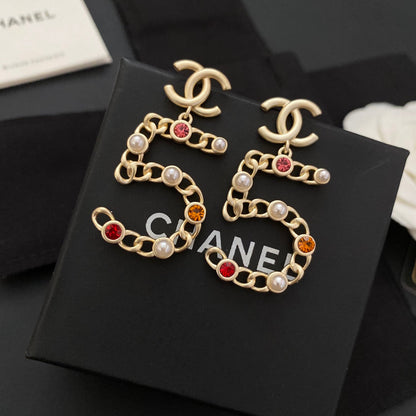 Nouvelles boucles d'oreilles n°5 en diamant de couleur