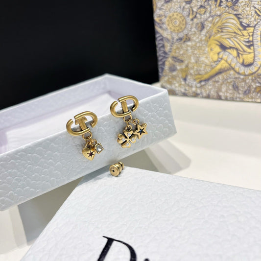 Boucles d'oreilles asymétriques porte-bonheur vintage